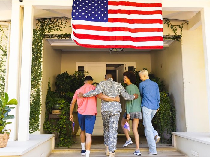 happy-diverse-group-of-friends-greeting-biracial-m-2025-04-03-09-08-06-utc