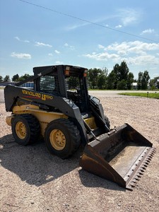 2004 NEW HOLLAND LS180 SKIDSTEER-WHEEL