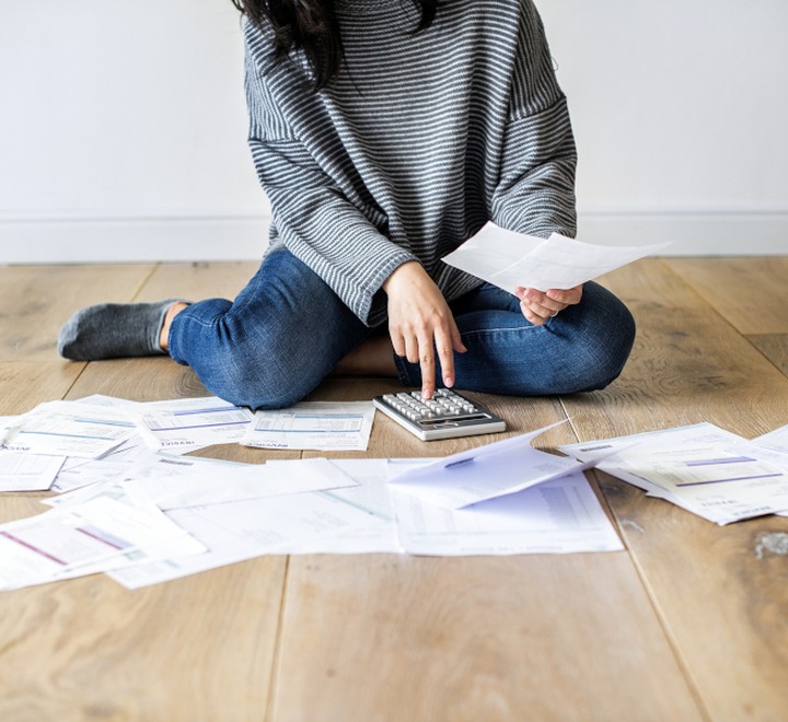 Woman managing finances at home